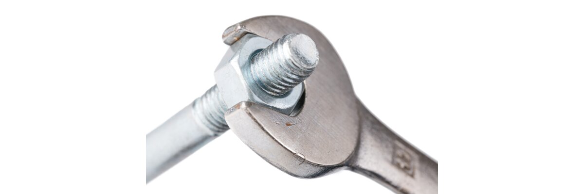 Wie sichert man Schrauben gegen Lockerung? - Sichere Schrauben dauerhaft – Die besten Methoden mit DIN 127 &amp; 985!